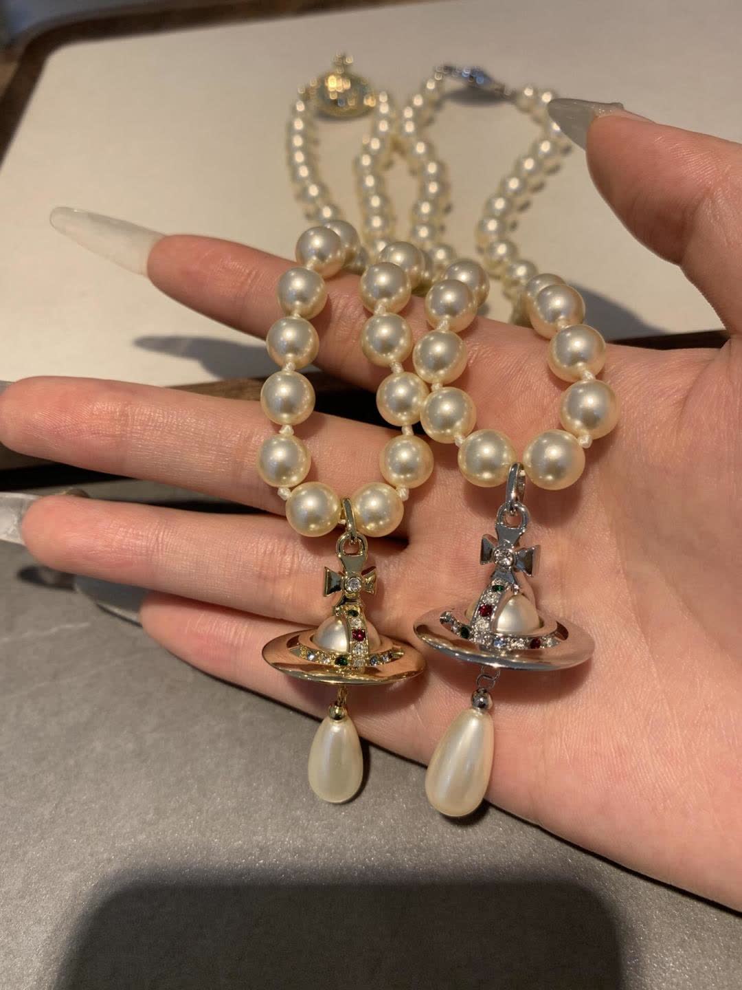 Vivienne Westwood Elegant Pearl Necklace with Pendant